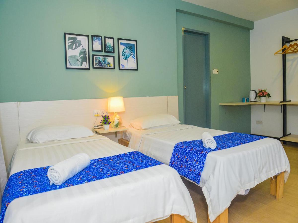 Treeline Urban Inn Kota Kinabalu Extérieur photo