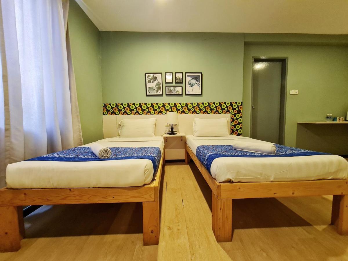 Treeline Urban Inn Kota Kinabalu Extérieur photo